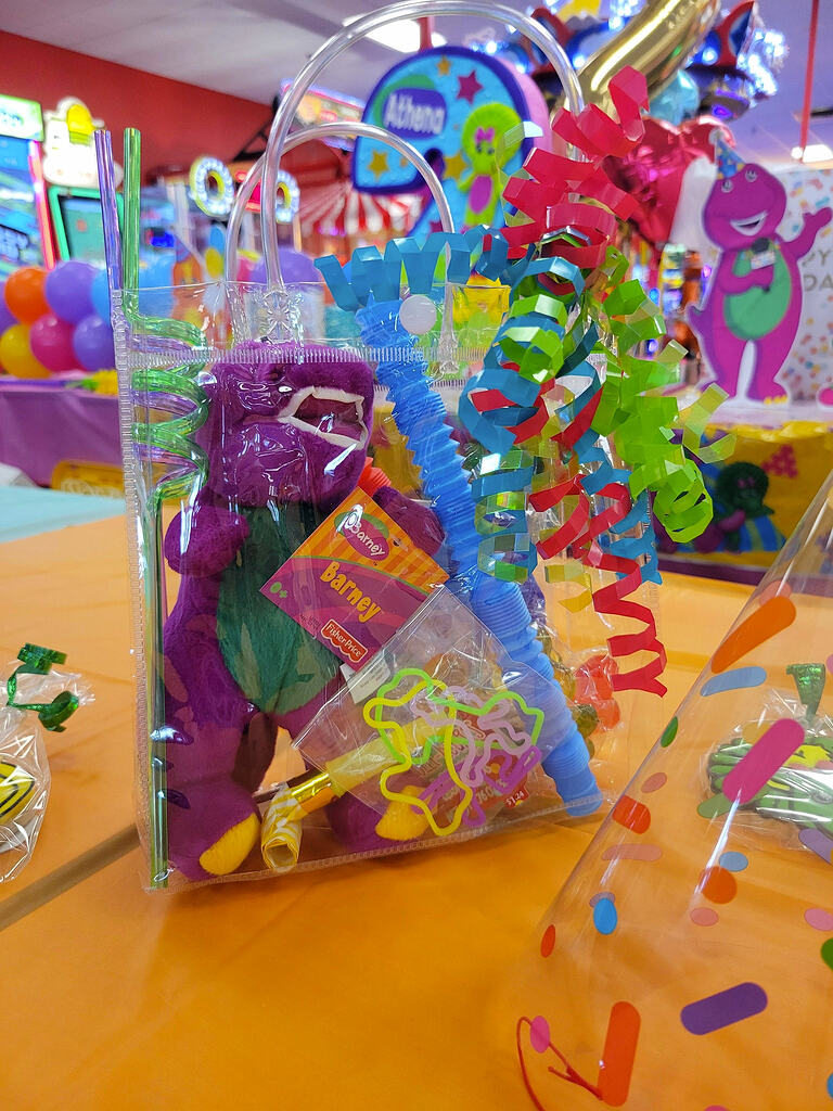 7 - Barney theme for a 2 year old girl - Barney party favor bag