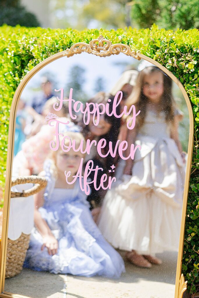 Ornate gold floor mirror featuring the pink vinyl script text Happily Tourever After.